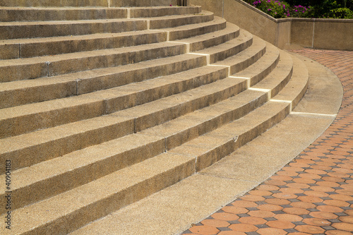 Curved concrete stairs.