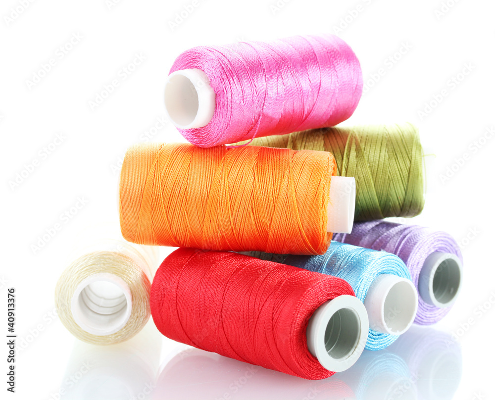 bright bobbin thread isolated on white. bright bobbin thread isolated on white.