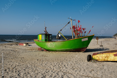 Fototapeta Naklejka Na Ścianę i Meble -  Fishing boat on the beach