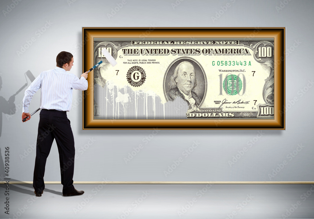 Fototapeta premium Businessman with a paint brush and banknote