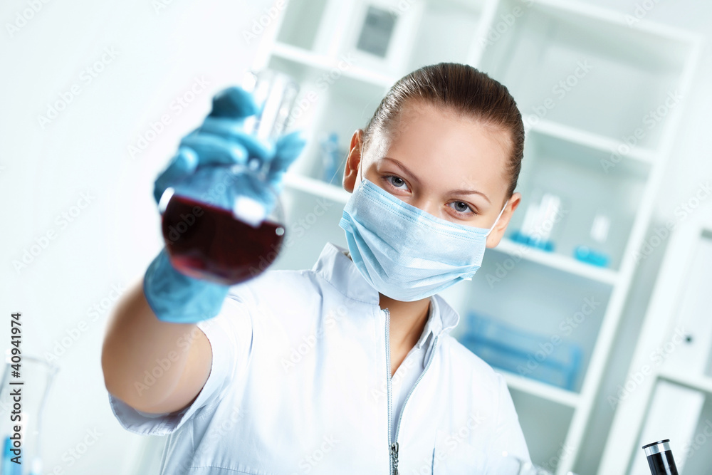 Young scientist working in laboratory Young scientist working in laboratory