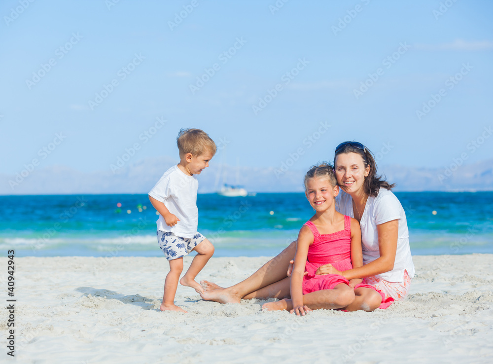 Happy family on tropical beach Happy family on tropical beach