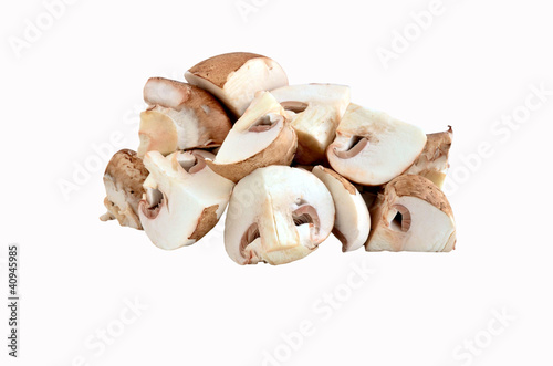 a heap of chopped mushrooms isolated on white