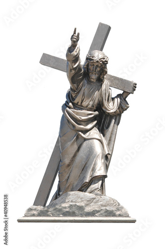 Statue of Jesus Christ with cross isolated