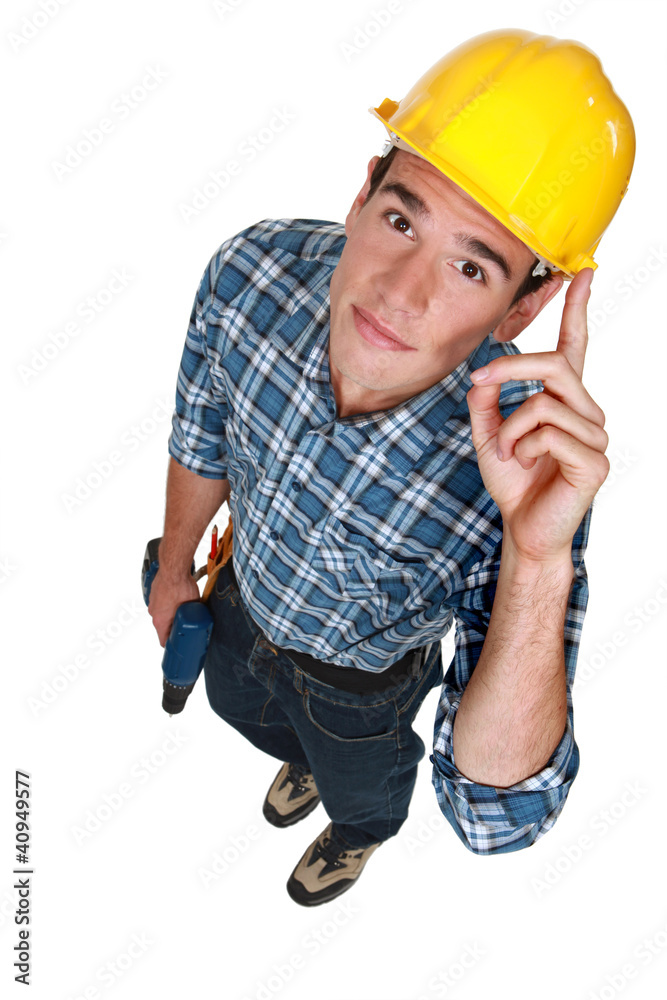 Young construction worker with a drill Young construction worker with a drill