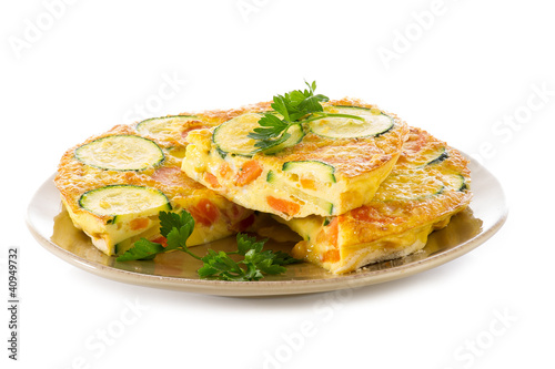 omelette with carrot zucchinis and parsley