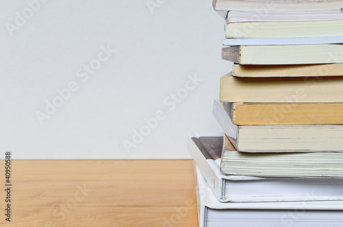 part of stacking book on wood table