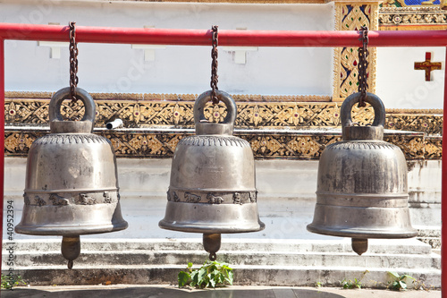three bells inside Thai temple