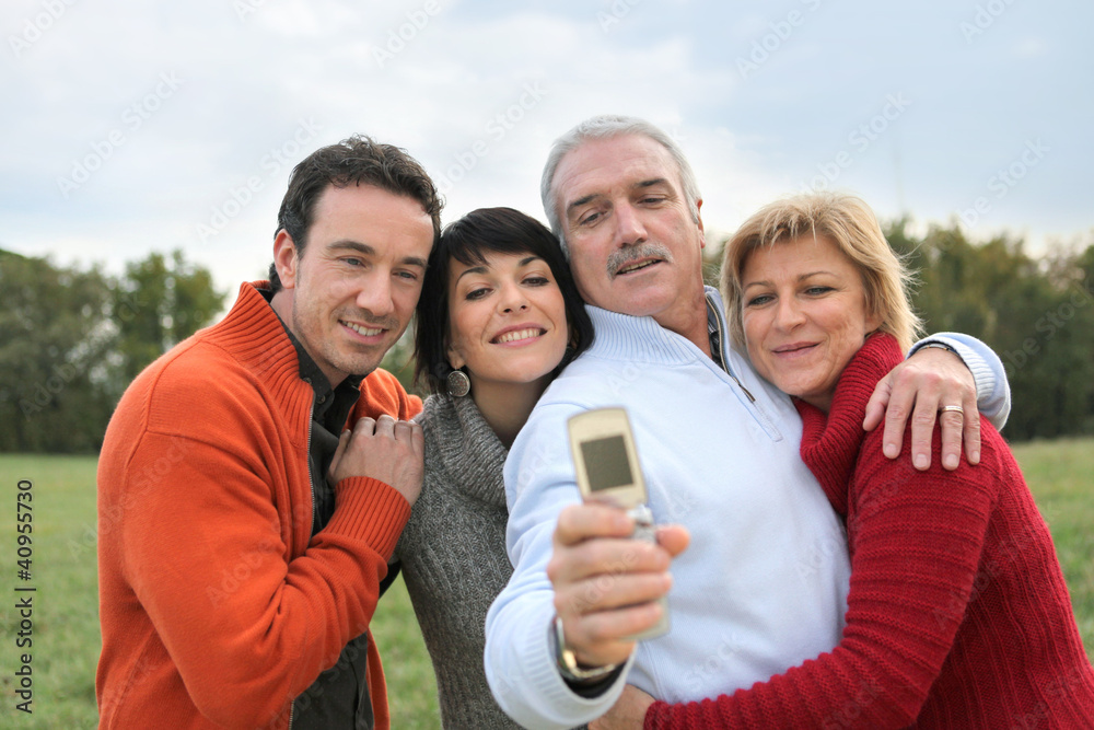 Fototapeta premium a family posing for a photo
