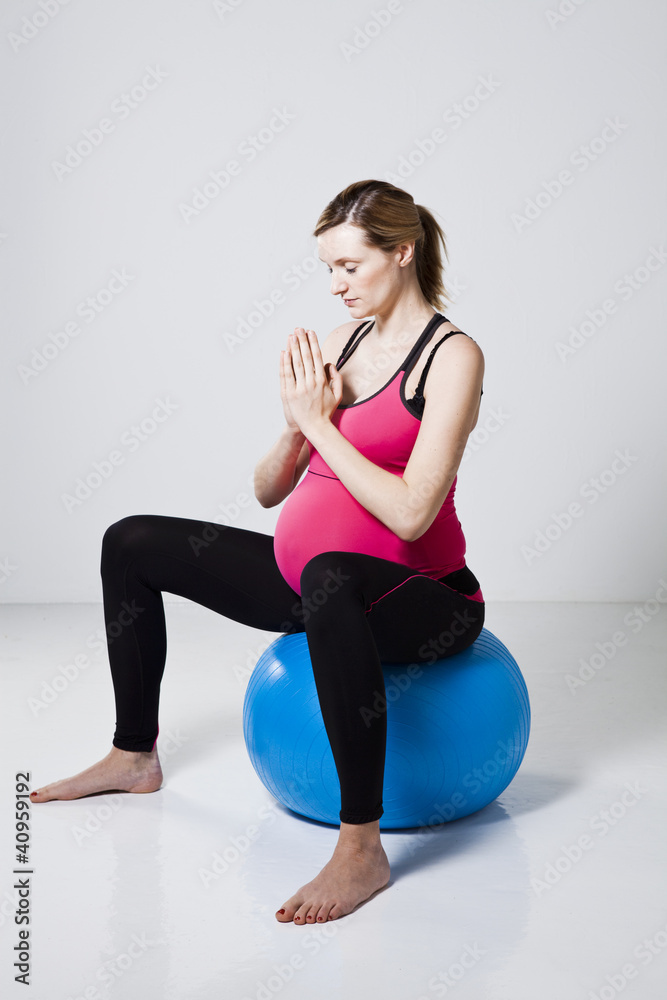 Pregnant woman meditating Pregnant woman meditating