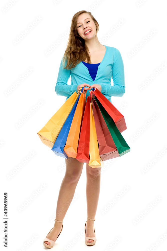 Young woman holding shopping bags
