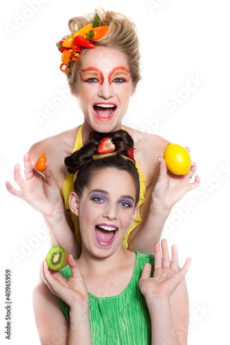 Beautiful Women decorated with Fresh Fruit and Vegetables