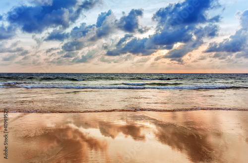 Tropical beach at sunset.