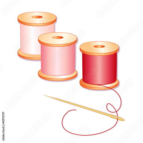 Spools of Threads in red, rose and pink, sewing needle