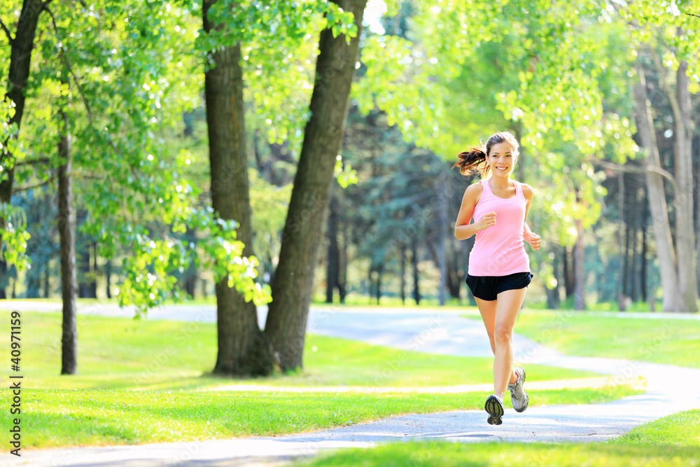 Jogging woman running in park Jogging woman running in park