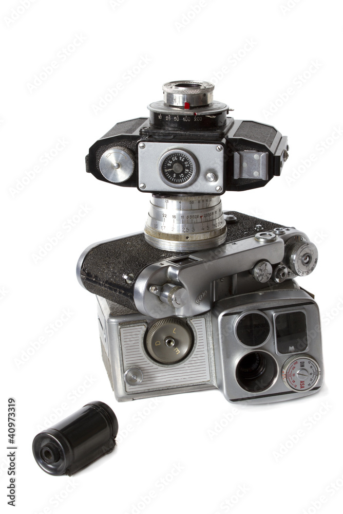 old  photocamera, videocamera and photoaccessories isolated on