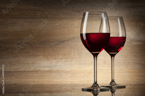 two Wine glases on a wooden Background