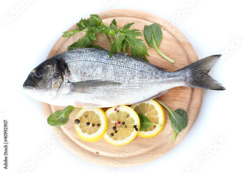 Fresh fish with lemon, parsley and spice