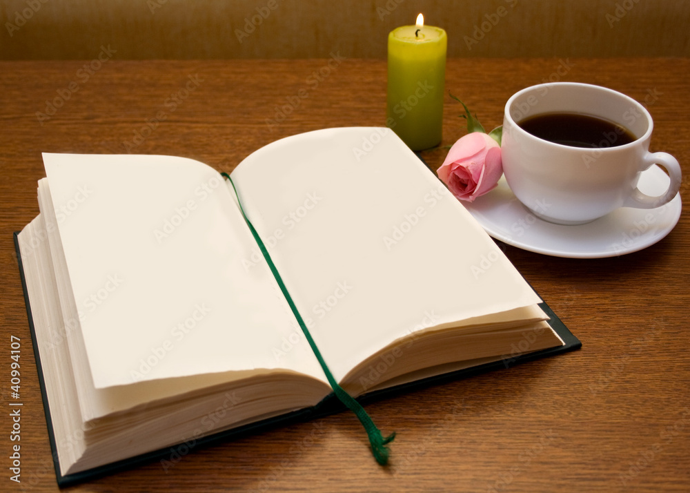Composition with books and cup of coffee on the table Composition with books and cup of coffee on the table