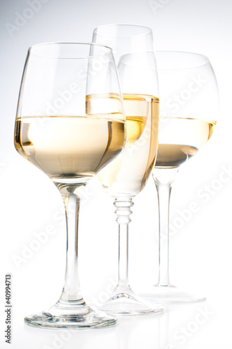 Three glasses of white wine