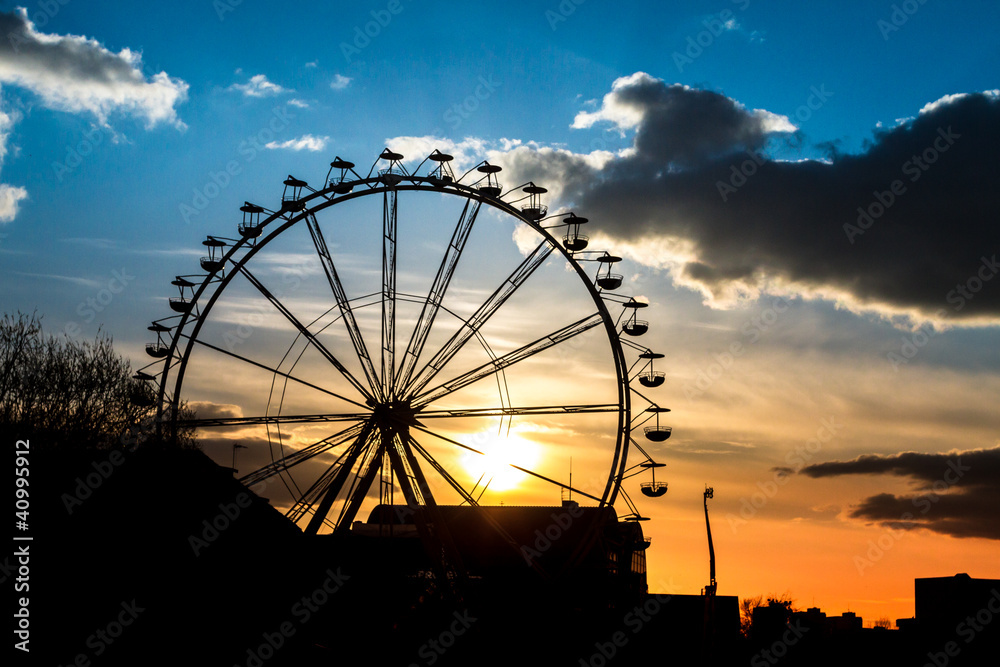 Sunset in amusement park at summer