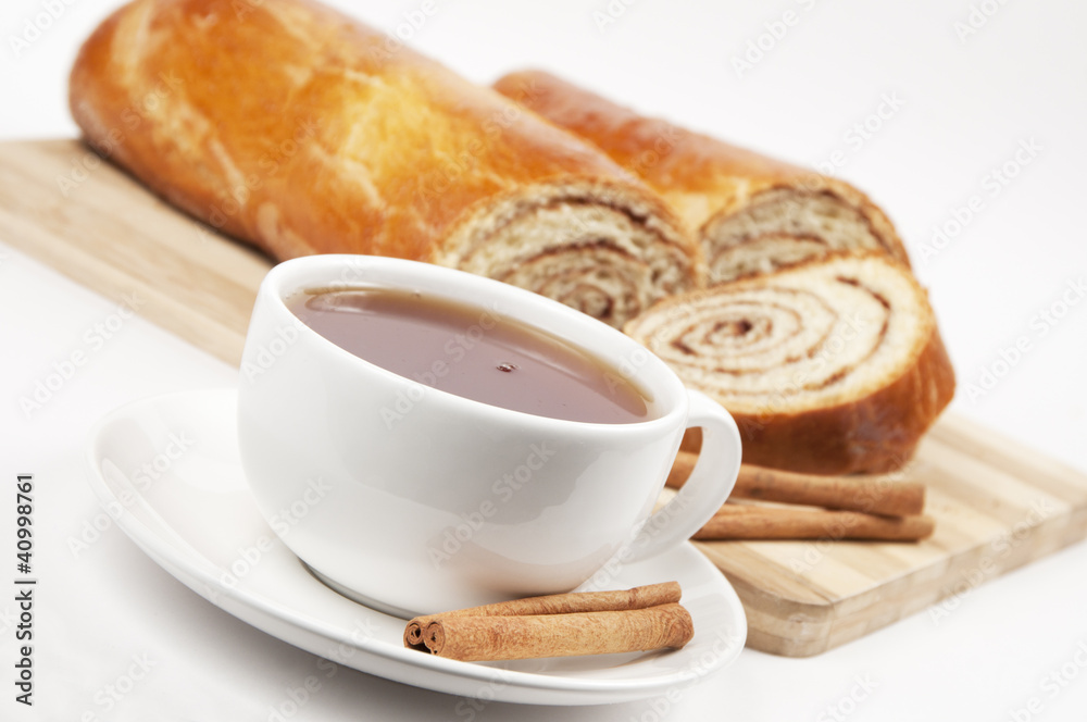Tea and home sweet rolls with cinnamon Tea and home sweet rolls with cinnamon