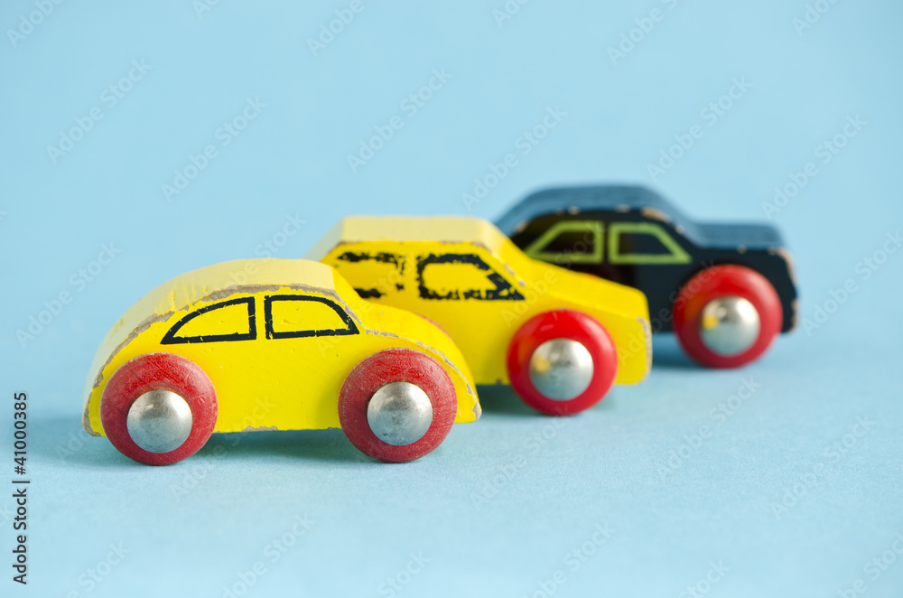 three wooden and old car toys three wooden and old car toys