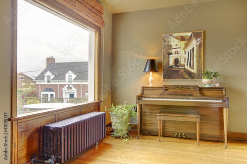 Old antique piano and living room with the view.