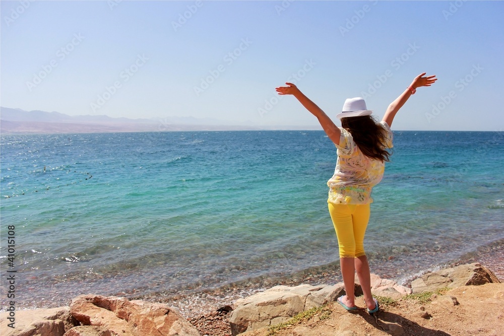 a young girl on the beach a young girl on the beach