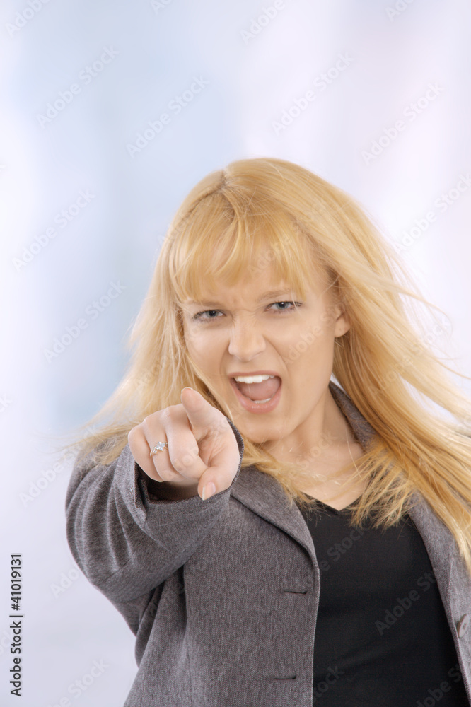 Closeup portrait of an angry young woman Closeup portrait of an angry young woman