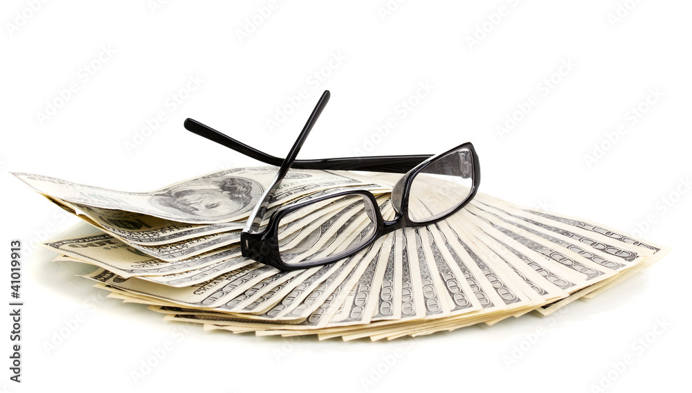 Dollar banknotes and glasses isolated on white Dollar banknotes and glasses isolated on white