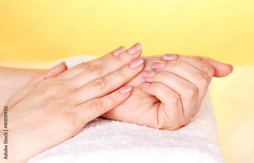 Female hands on towel Female hands on towel