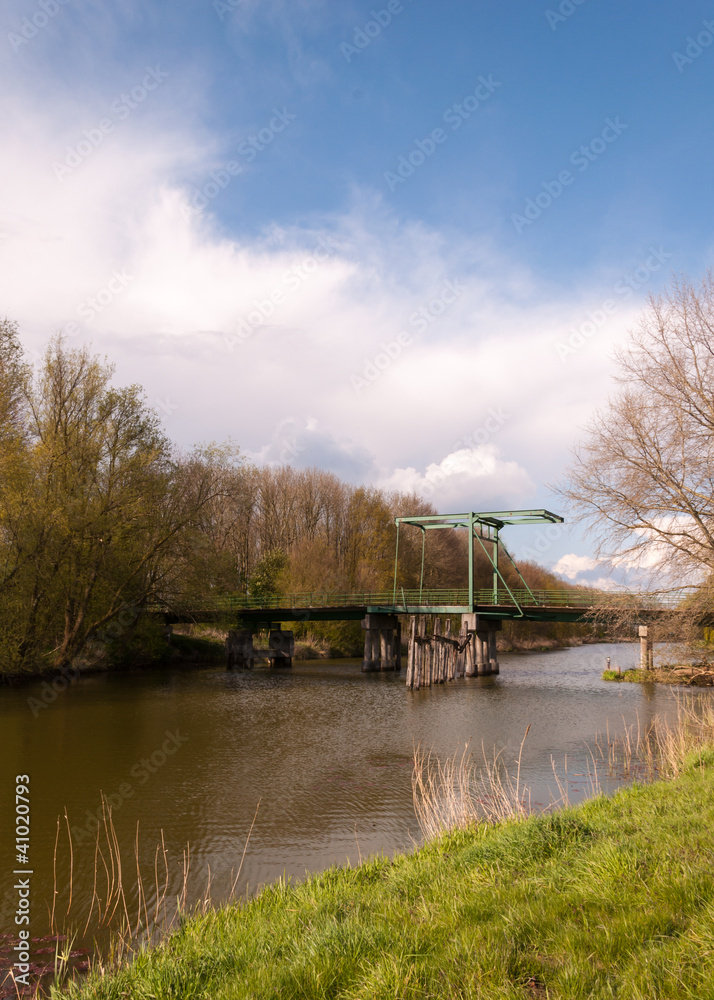 Old drawbridge in a natural landscape Old drawbridge in a natural landscape
