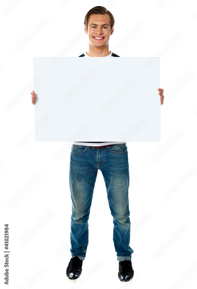 Full length view of man showing blank signboard Full length view of man showing blank signboard