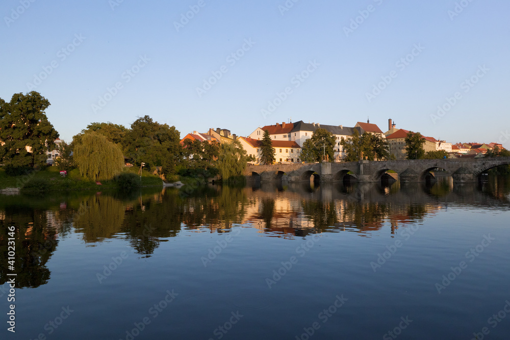 city of Pisek reflects on the Otava river in southern Czech