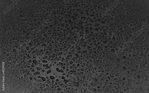 sfondo di gocce d'acqua su pannello nero