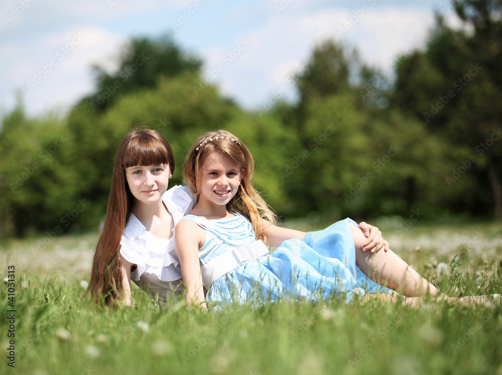 Fototapeta premium two girls playing in the park