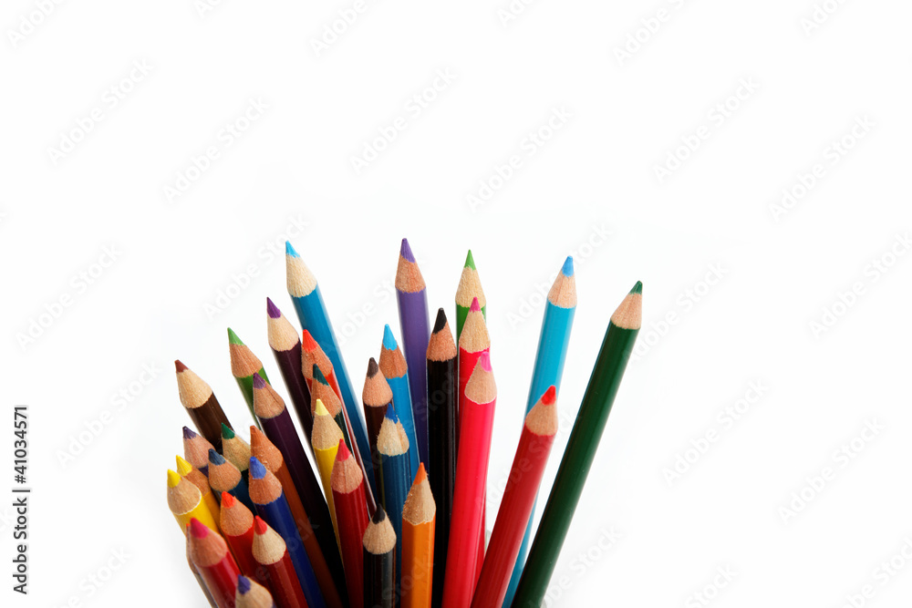 Close up of color pencils with different color over white backgr