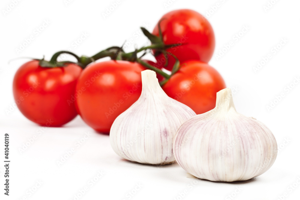 a lot of tomatoes and garlic a lot of tomatoes and garlic