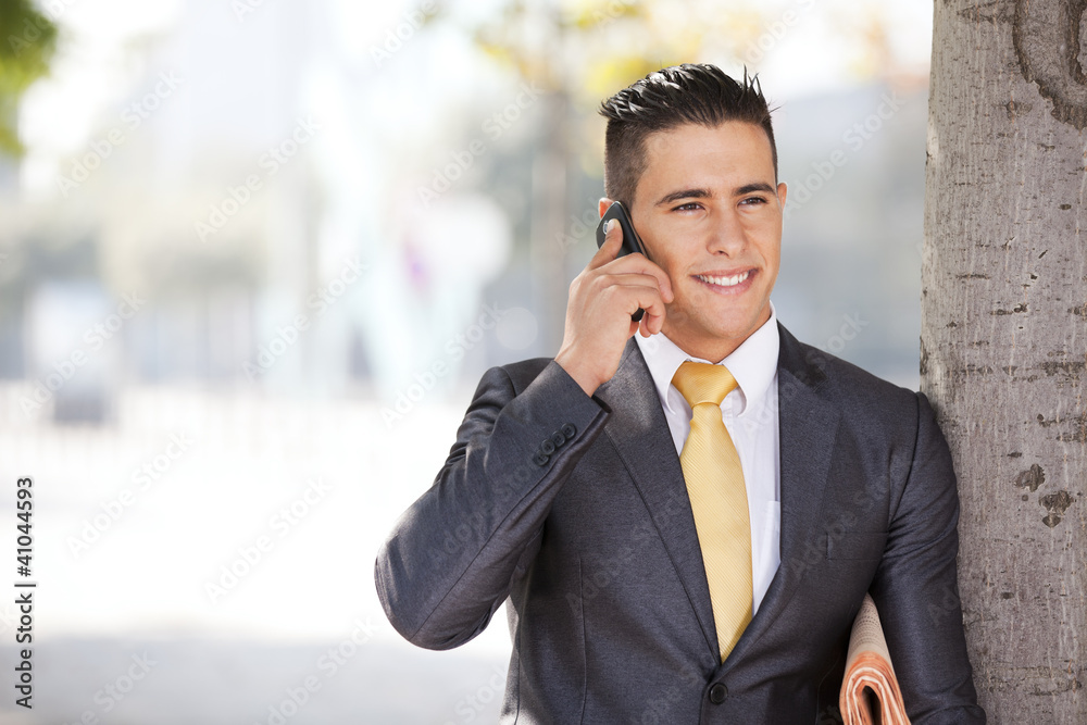 businessman talking at his cellphone businessman talking at his cellphone