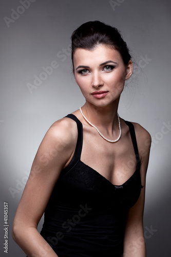 Portrait of luxury woman in exclusive jewelry
