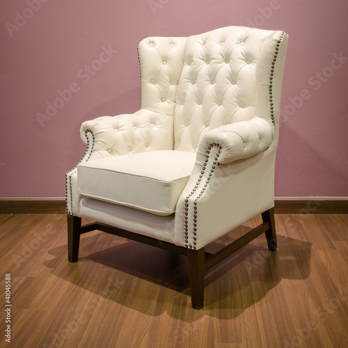 Side of Classic Chesterfield luxury White Leather armchair