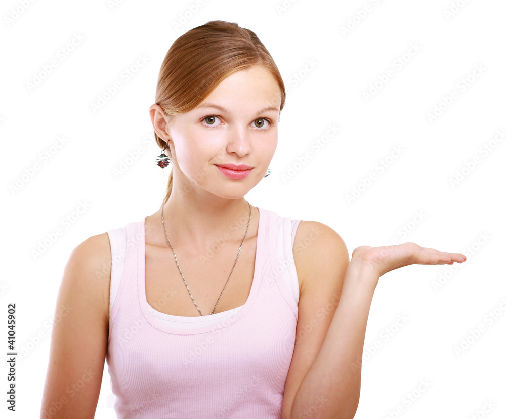 A young girl holding something , isolated on white background A young girl holding something , isolated on white background