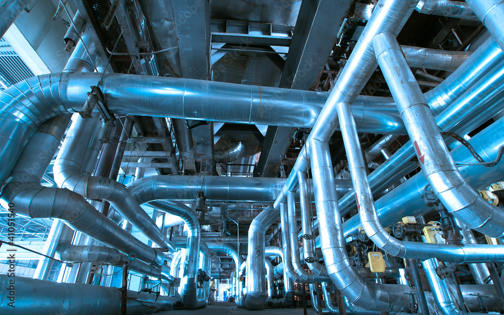 Equipment, cables and piping as found inside of a modern industr Equipment, cables and piping as found inside of a modern industr