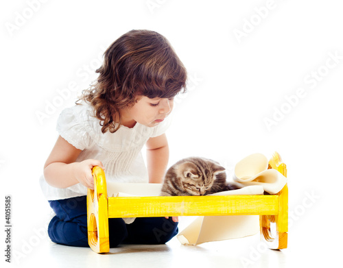 curly child girl playing wi...
