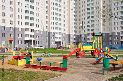 Children's playground in the yard © olgavolodina