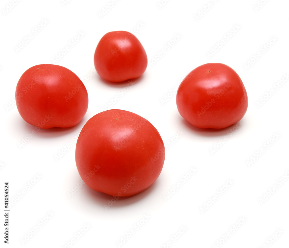 Red tomatos on white background. Red tomatos on white background.