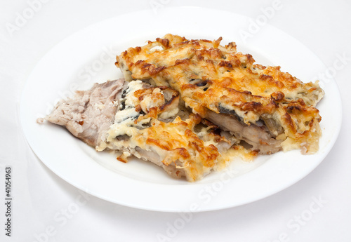 fish baked under cheese