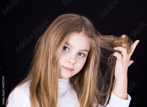 girl playing with hair