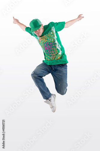 dancer jumps into the air and holds a pose